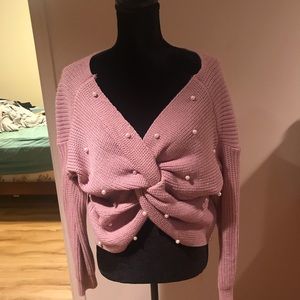 Pink sweater with pearl detailing